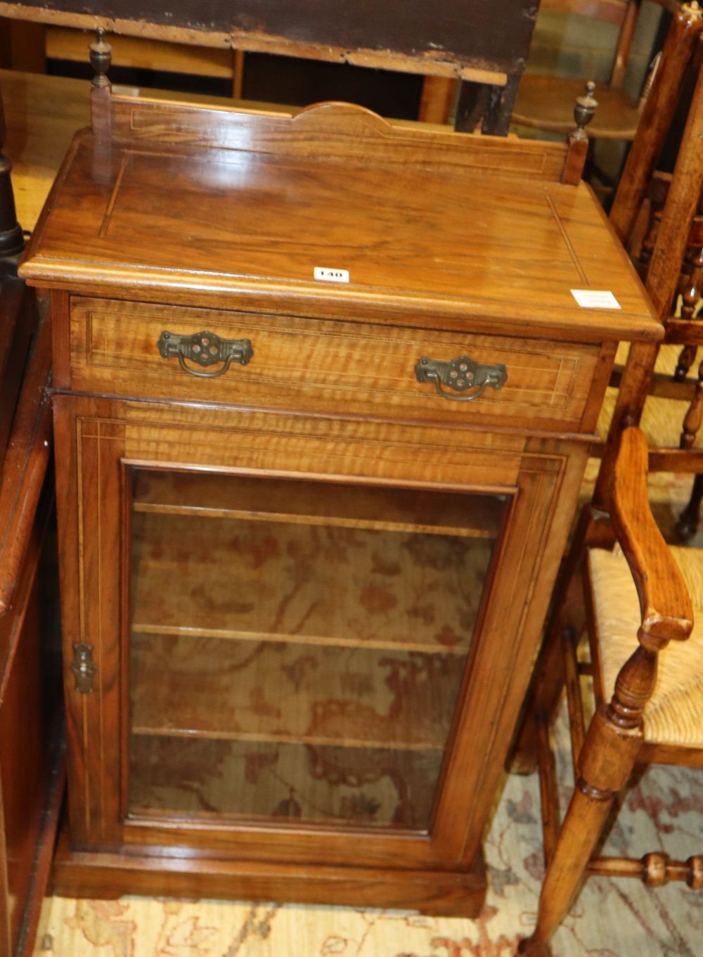 An Edwardian satinwood banded walnut music cabinet, W.59cm, D.36cm, H.94cm